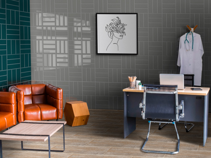 Estudio con diseño sobrio y bricks en la pared