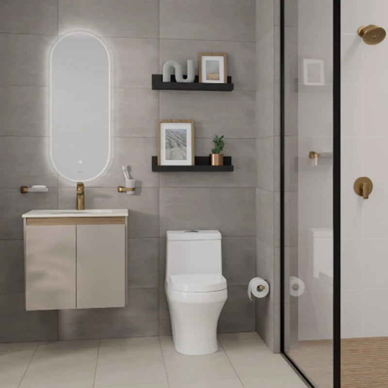 Baño moderno en tonos grises y dorados