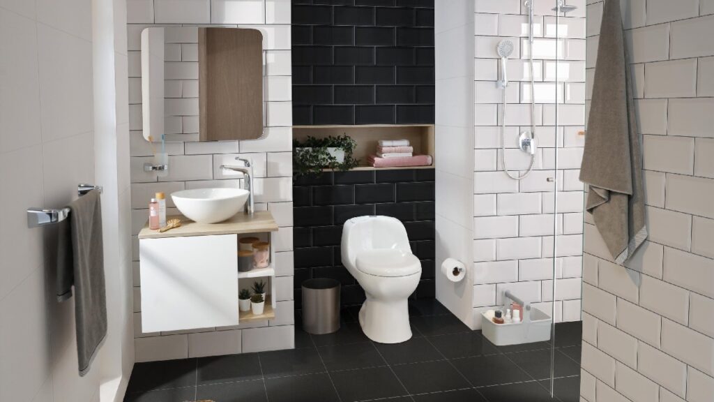 Baño con bricks en las paredes y muebles