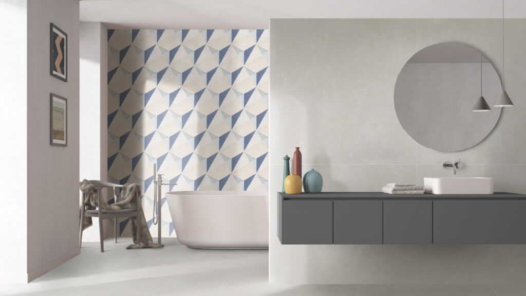 Ambiente baño Corona con piso PORCELANATO® Manet marfil y pared hexágono Marden azul.