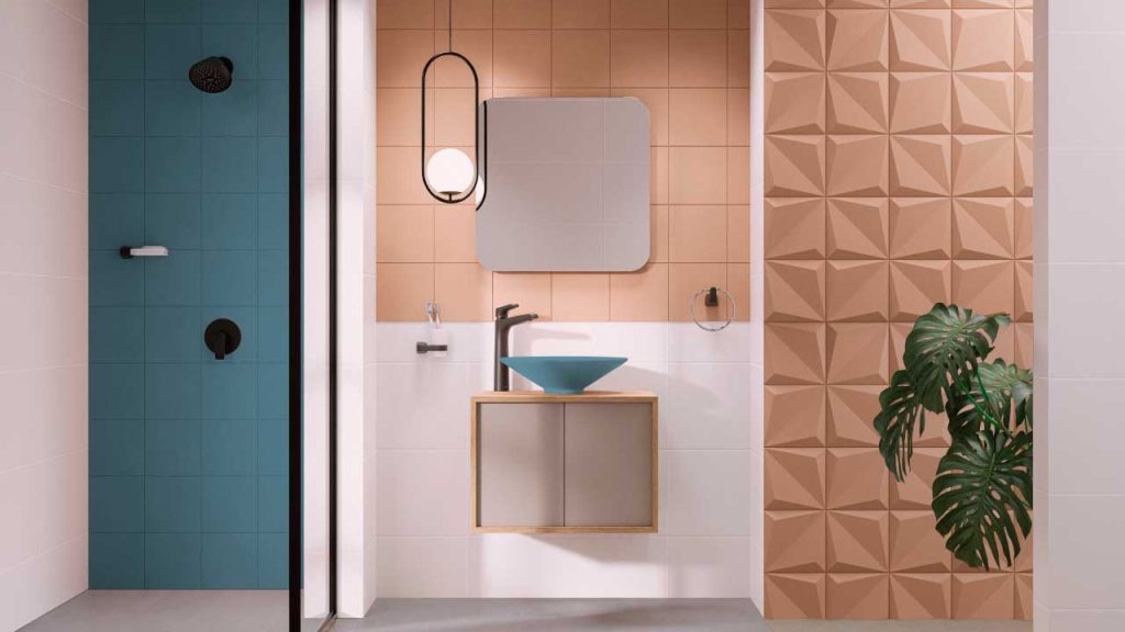 Baño en tonos rosados con la tendencia color block